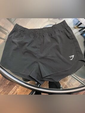 Gymshark Black Workout Shorts with White Logo Tag